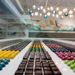beta a store interior with rows of colourful chocolates at beta5