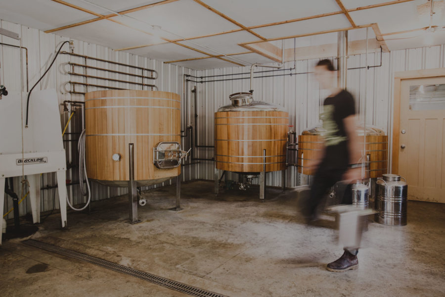 man walking by ampersand stills